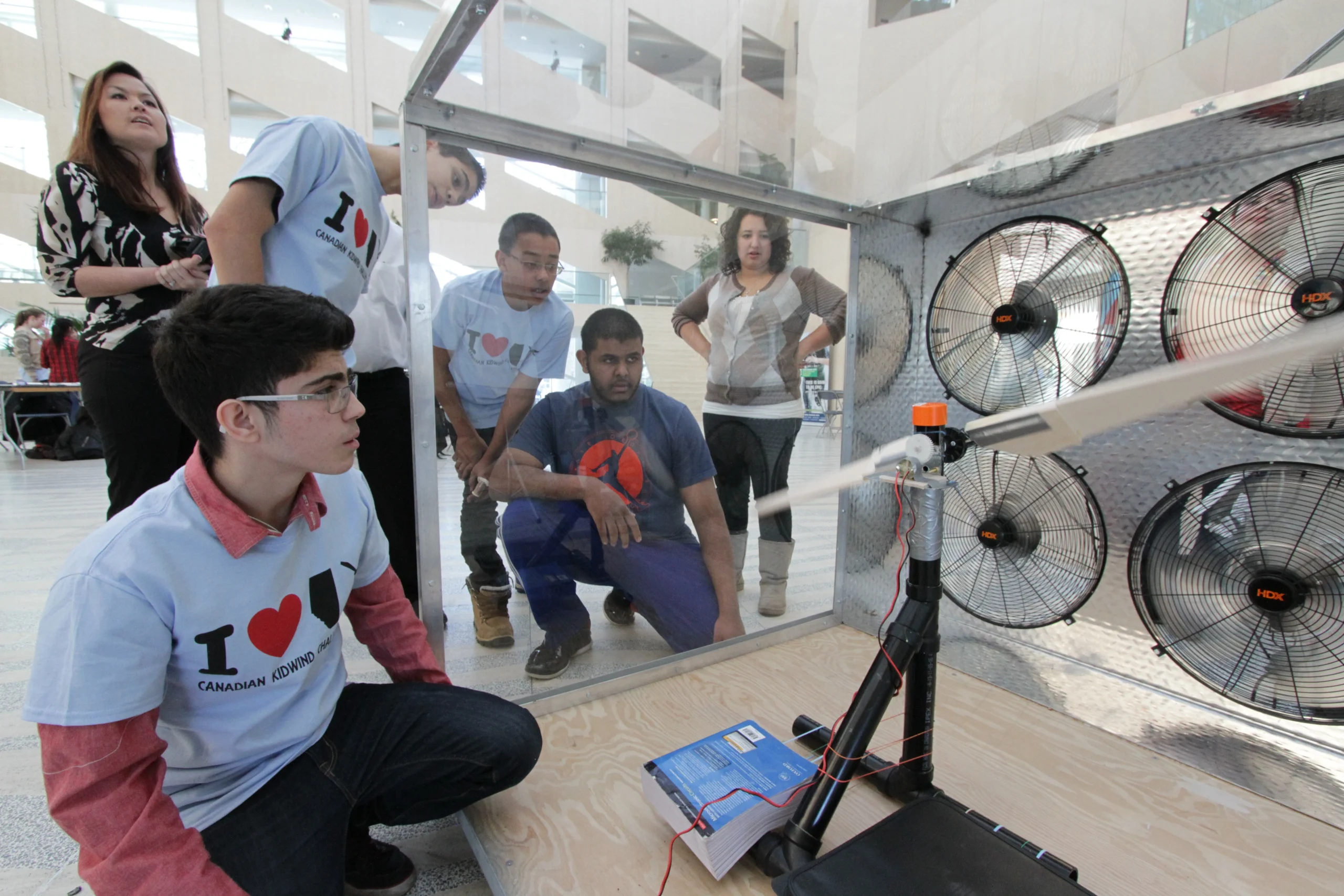 Team SLISE from Queen Elizabeth High School in Edmonton testing their wind turbine in the wind tunnel.